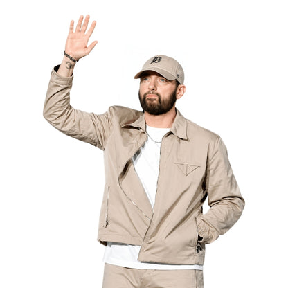 Man wearing beige bomber jacket 