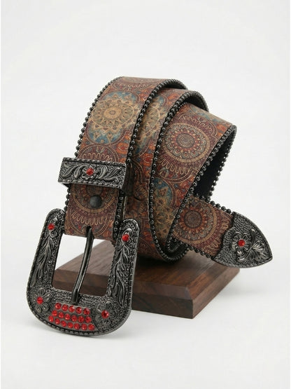 Decorative belt with intricate design and red gemstones on a white background