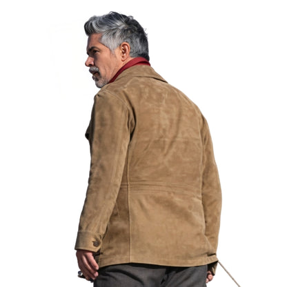 Man wearing a brown suede jacket on a white background