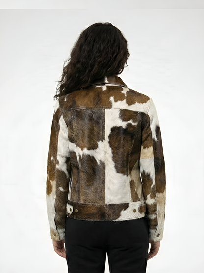 Person wearing a cowhide leather jacket on a white background