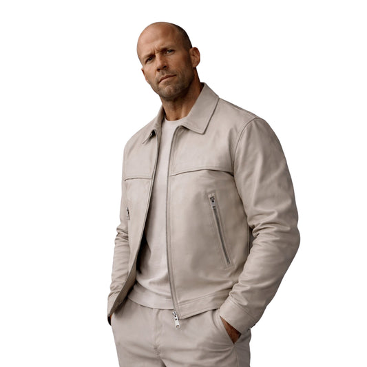 Man wearing a beige leather jacket and pants on a white background