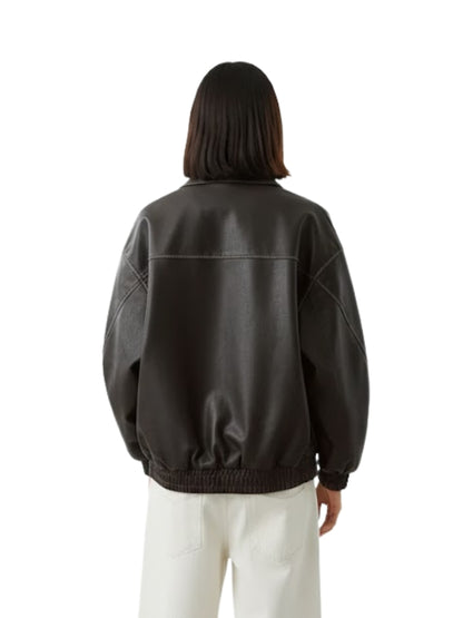 Person wearing a black leather jacket on a white background