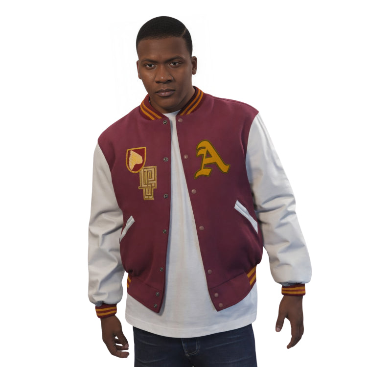 Man wearing a maroon and white varsity jacket with letterman design on a white background