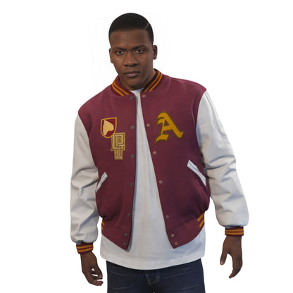 Man wearing a maroon and white varsity jacket with letterman design on a white background
