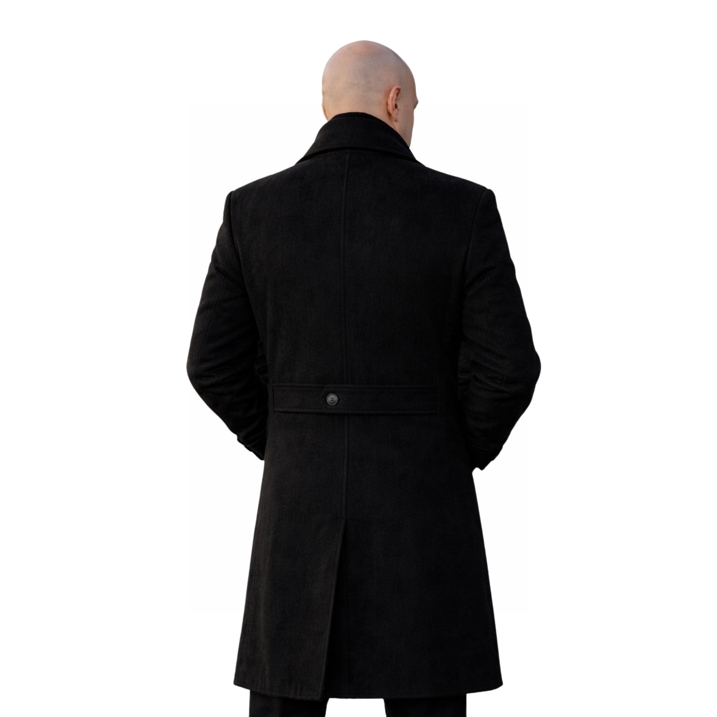 Person wearing a black coat from behind on a white background