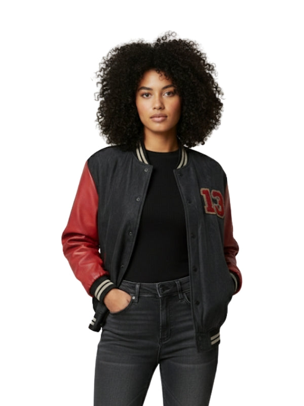 Person wearing a black and red varsity jacket with number 13 on a white background