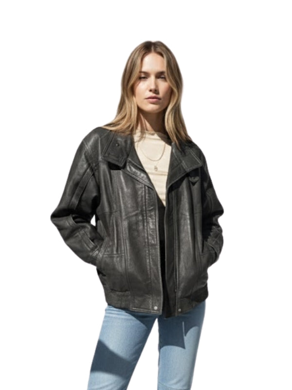 Woman wearing a black leather jacket on a white background