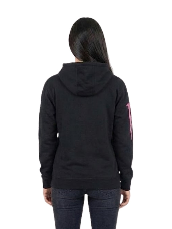 Person wearing a black hoodie with pink text on the back, standing against a white background