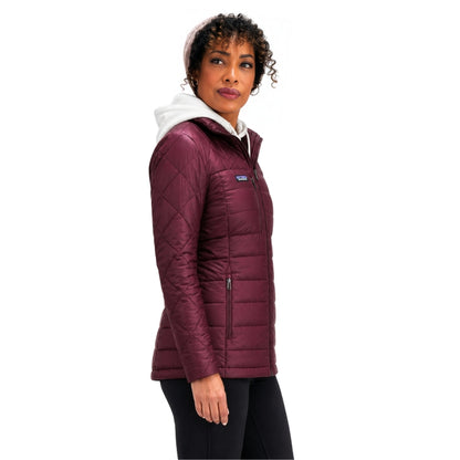 Woman wearing maroon puffer jac
