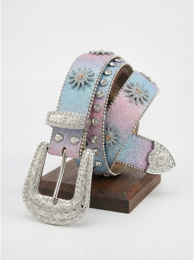 Decorative belt with floral designs and a silver buckle on a white background