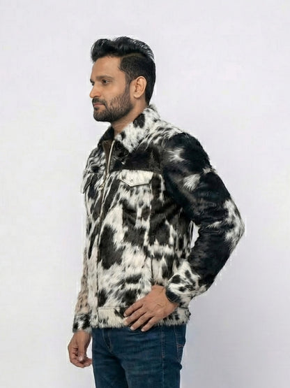 Man wearing a black and white patterned jacket on a white background