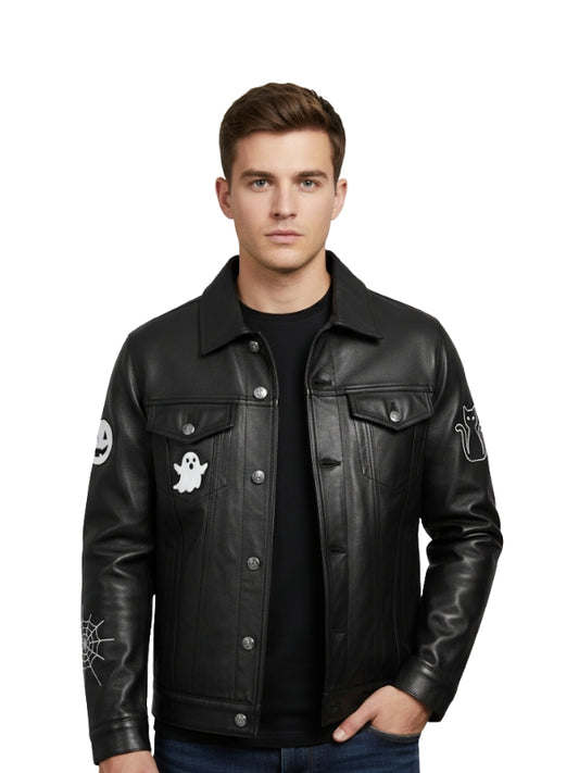 Man wearing a black leather jacket with ghost and spider web designs on sleeves against a white background