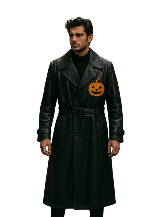 Man wearing a black coat with a pumpkin design on a white background