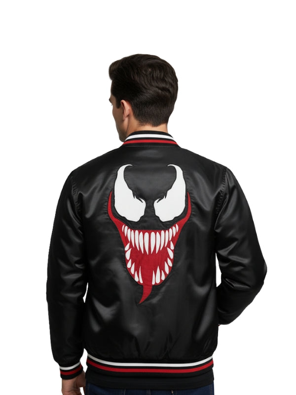Black jacket with a red and white logo on the back, worn by a person against a white background