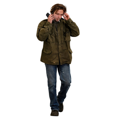 Man in a green jacket and blue jeans on a white background