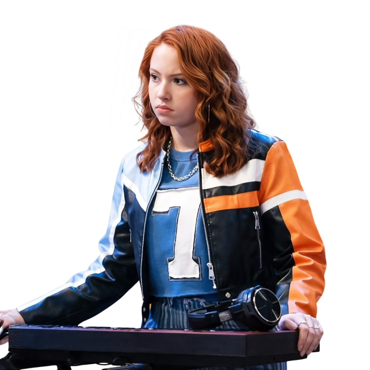 Person wearing a colorful jacket with a number 1 design, holding a keyboard and headphones on a white background