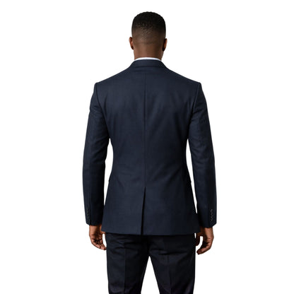 Man wearing a navy suit on a white background