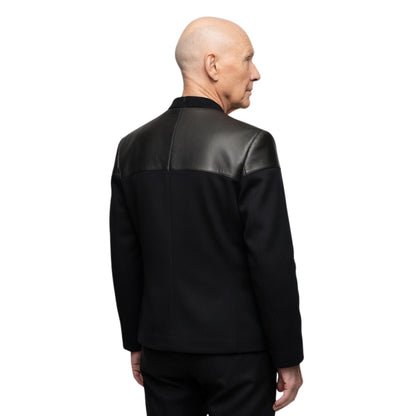 Person wearing a black leather jacket on a white background