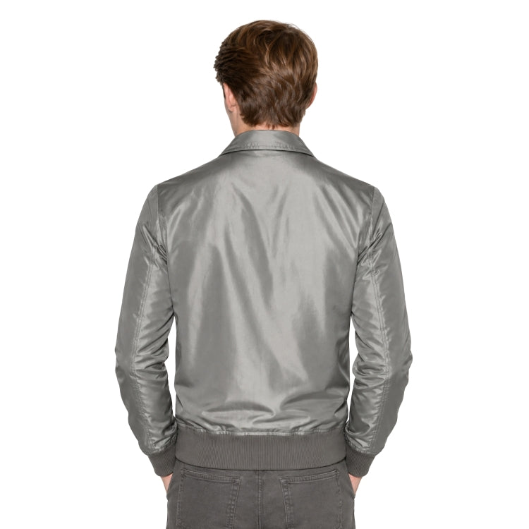 Person wearing a grey bomber jacket 