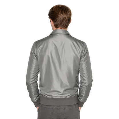 Person wearing a grey bomber jacket 