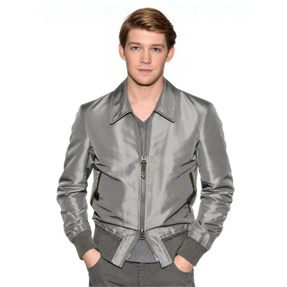 Man wearing a grey bomber jacket