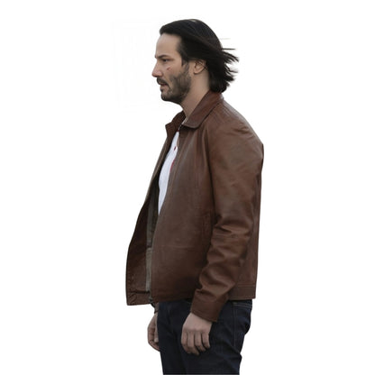 Person Wearing a white t-shirt with a brown leather jacket 
