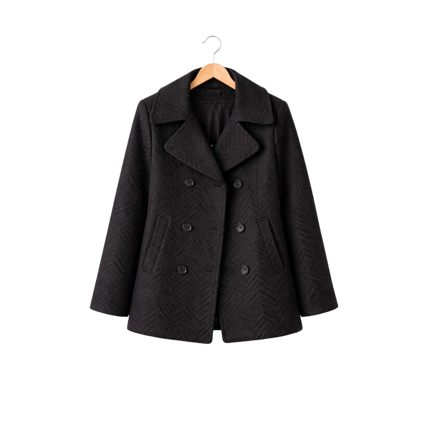 Black coat on a hanger against a white background