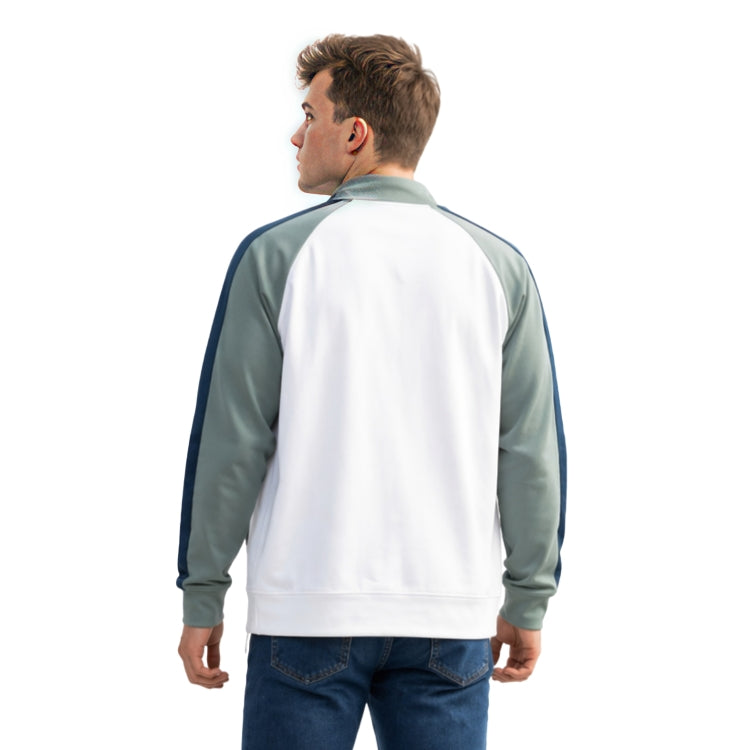 Man wearing a white and gray jacket on a white background