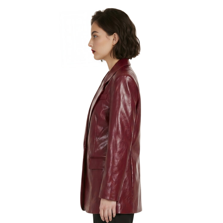 Woman wearing a burgundy leather coat on a white background