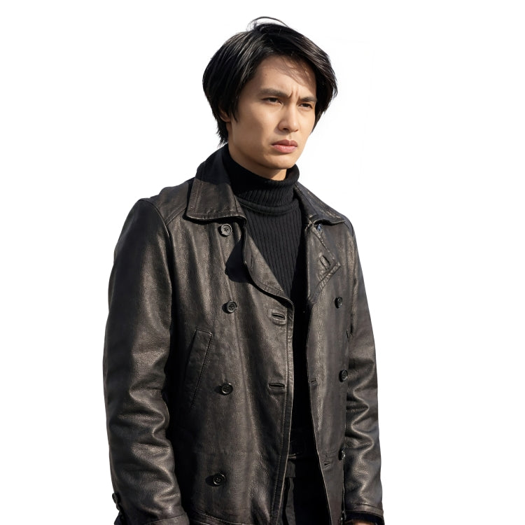 Man wearing a dark leather coat over a black turtleneck on a white background