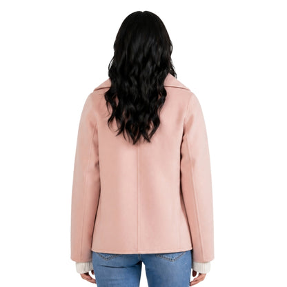 Woman wearing a pink wool fabric pea coat 