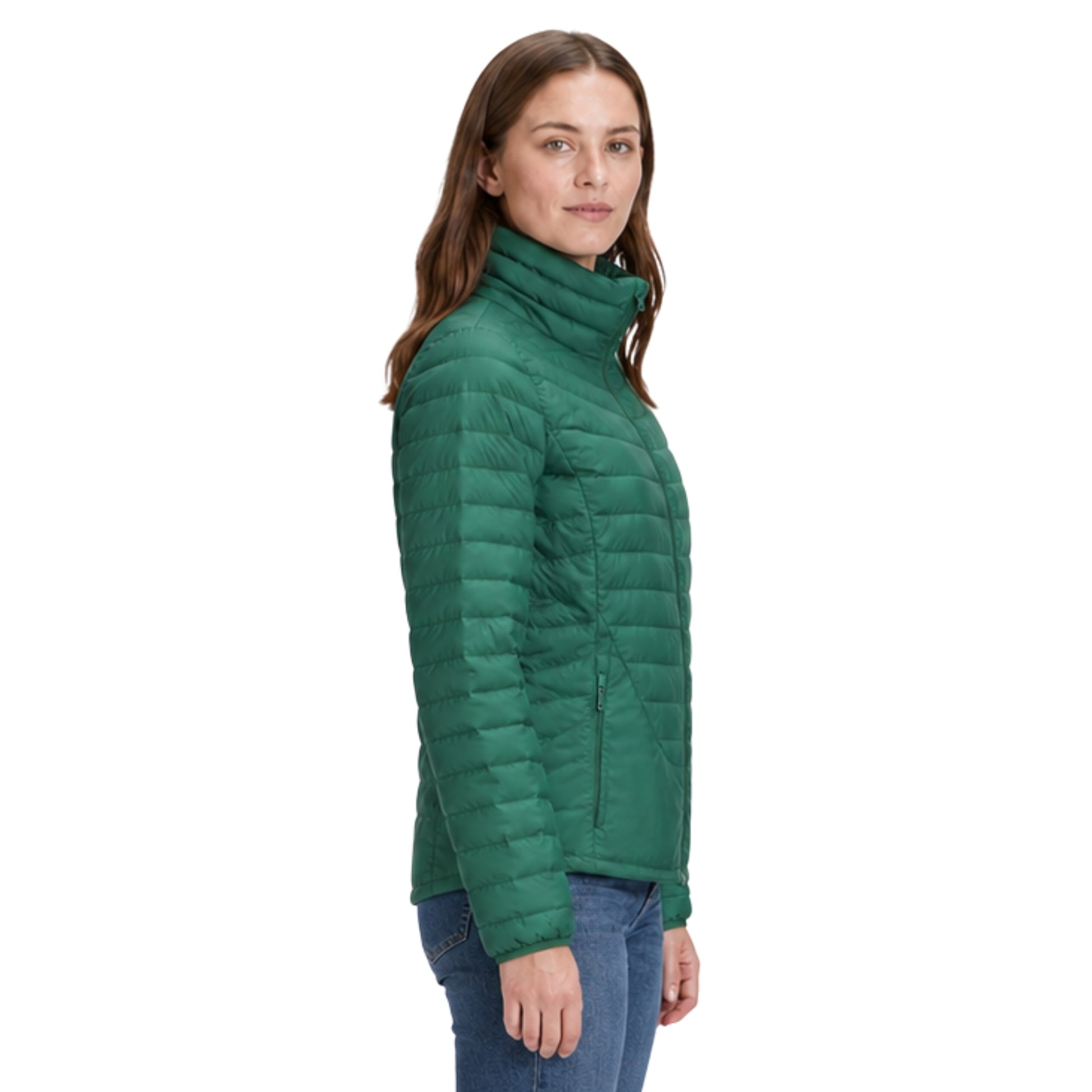 Woman wearing a green puffer jacket on a white background