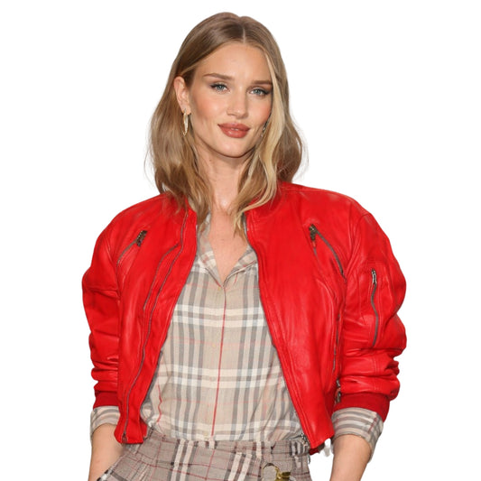Woman wearing a red leather jacket on a white background