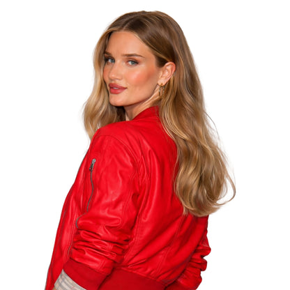 Woman wearing a red jacket on a white background