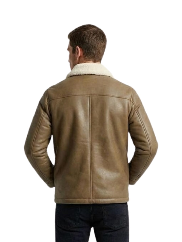 Man wearing a brown leather jacket with white fur lining on a white background