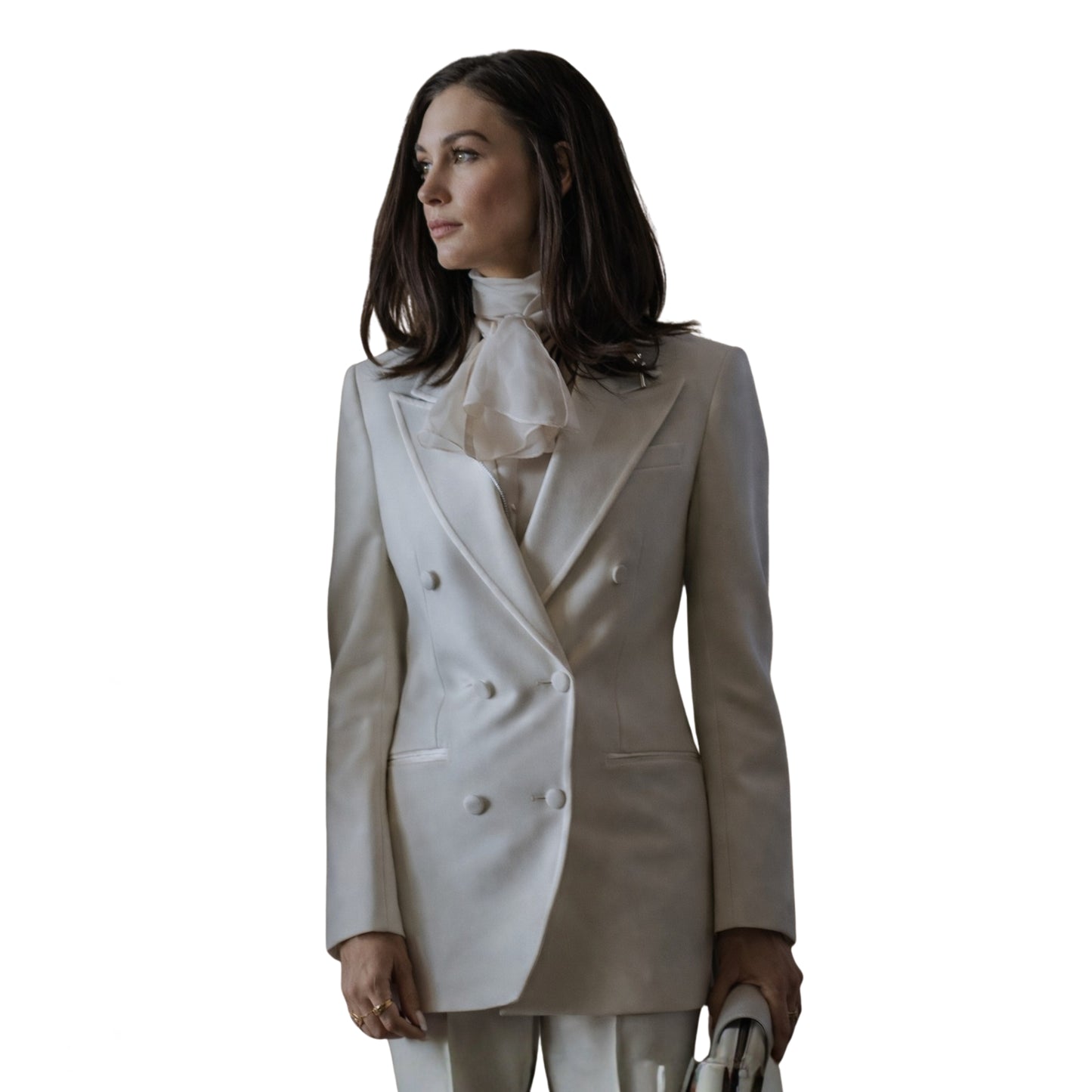 Woman wearing a two-tone blazer with a white background