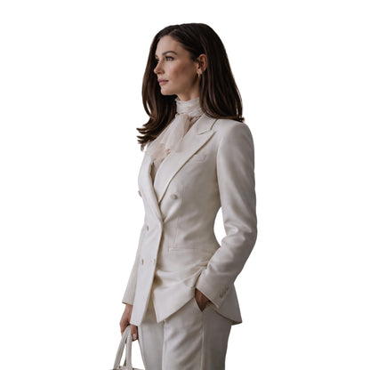 Woman wearing a white suit on a white background
