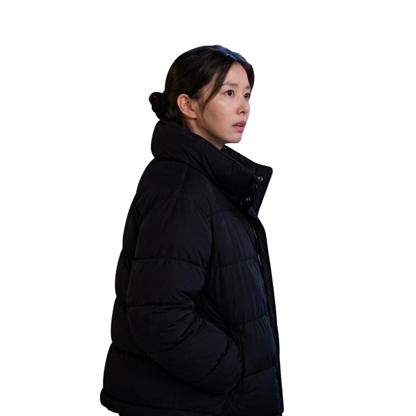 Person wearing a black puffer jacket on a white background