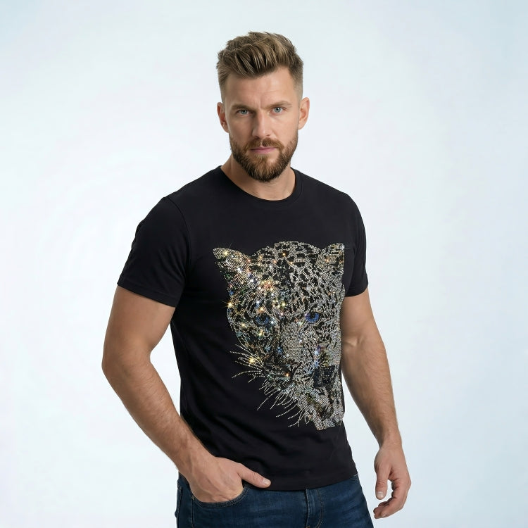 Man wearing a black t-shirt with a sequined leopard design on a light gray background