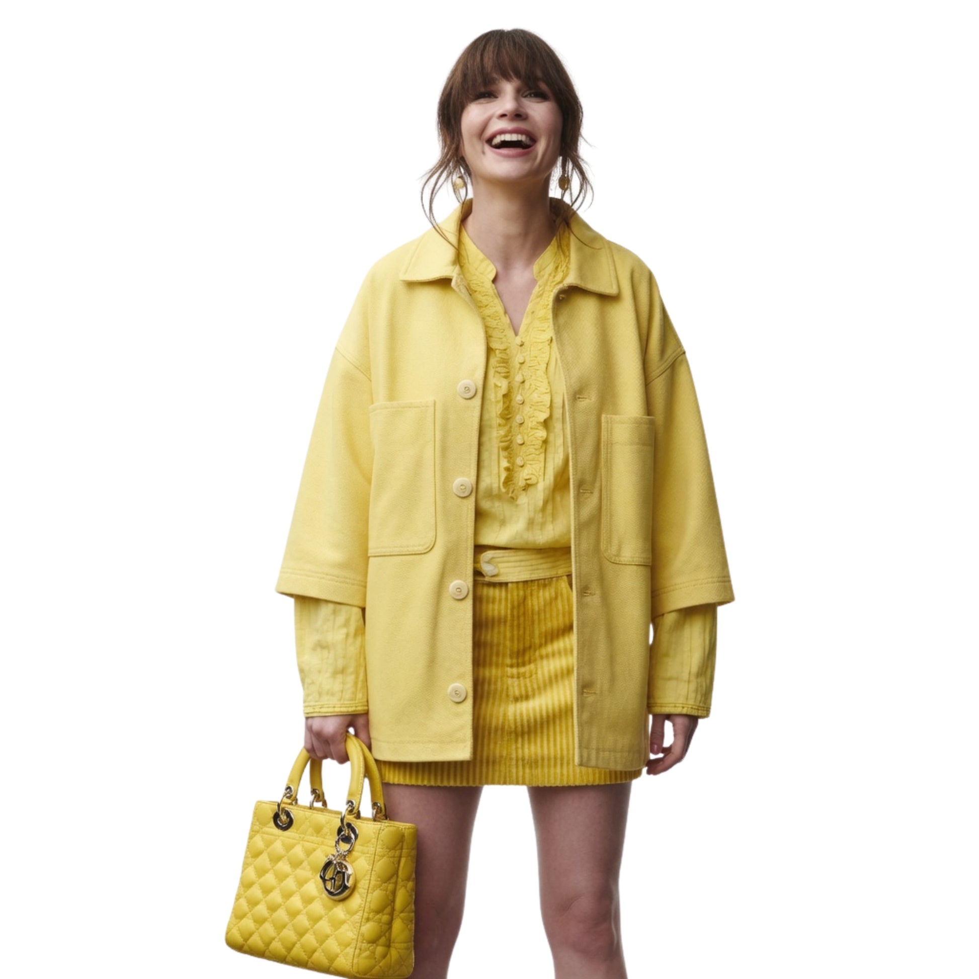 Woman wearing a yellow outfit with a matching handbag on a white background
