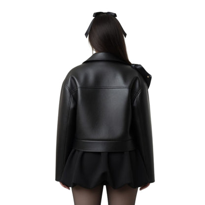 Black leather jacket worn by a person on a white background