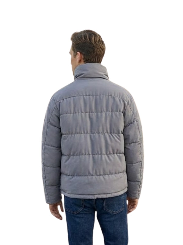 Man wearing a gray puffer jacket on a white background