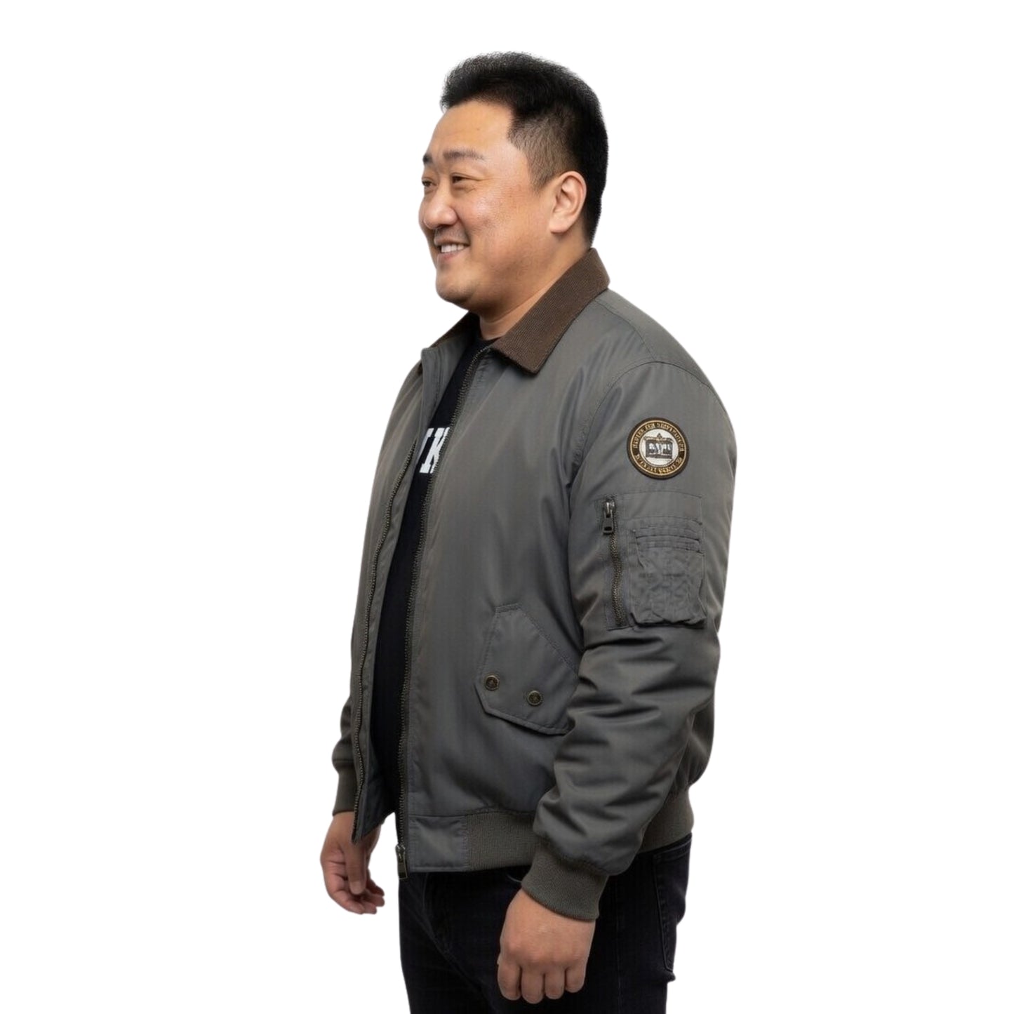 Man wearing a gray jacket with a patch on a white background