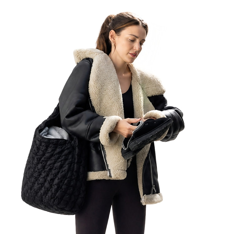 Person Wearing a black jacket 