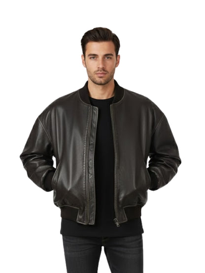 Man wearing a black leather bomber jacket on a white background