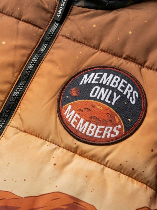 Brown puffer jacket with 'Members Only' patch featuring space design
