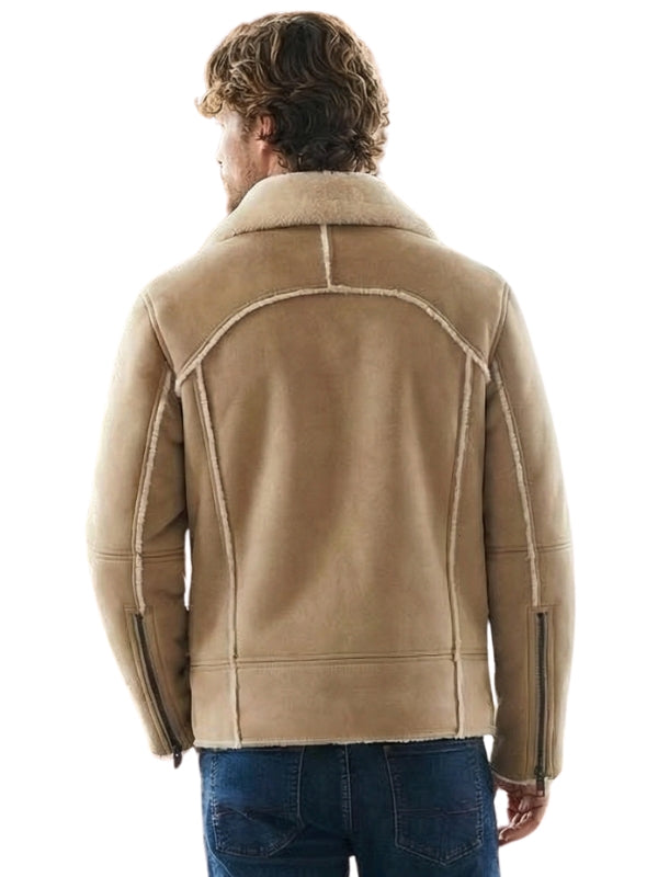 Man wearing a beige shearling jacket on a white background