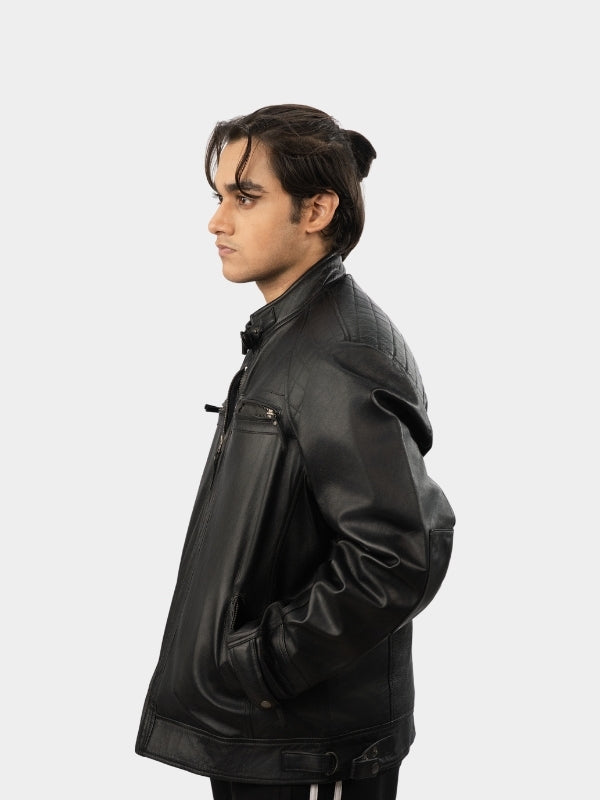 Person wearing a black leather jacket on a white background