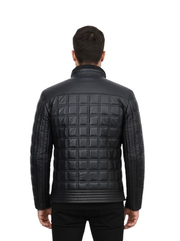 Man wearing a black quilted jacket on a white background