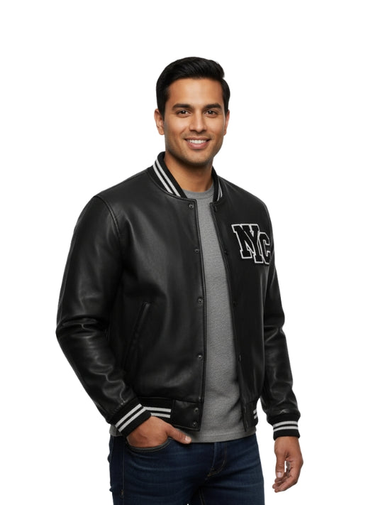 Man wearing a black varsity jacket with 'NYC' on a white background